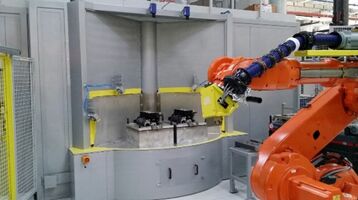 Roboterarm und vollautomatisierter Injektor-Strahlautomat